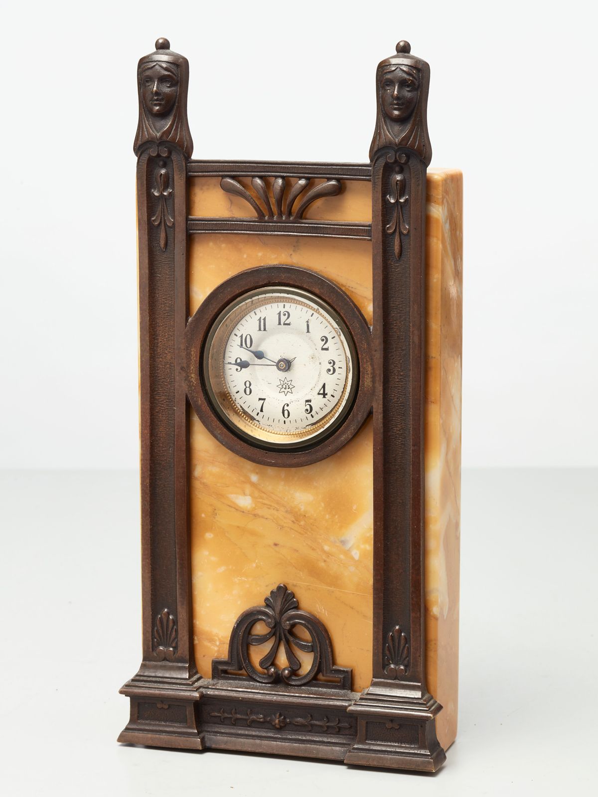 A German ‘Art Deco’ bronze and marble mantel clock by Junghans, circa 1920 - image 1