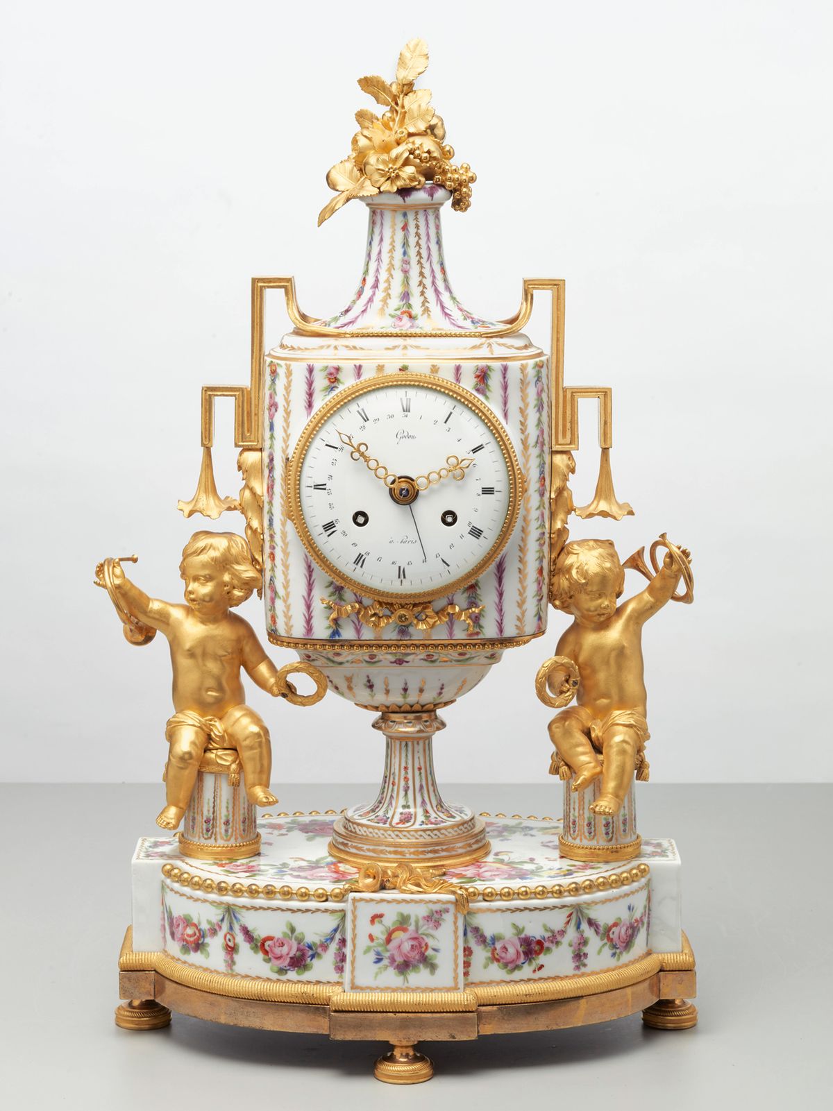Rare French porcelain and gilt bronze mantel clock by Godon, circa 1785 - image 1