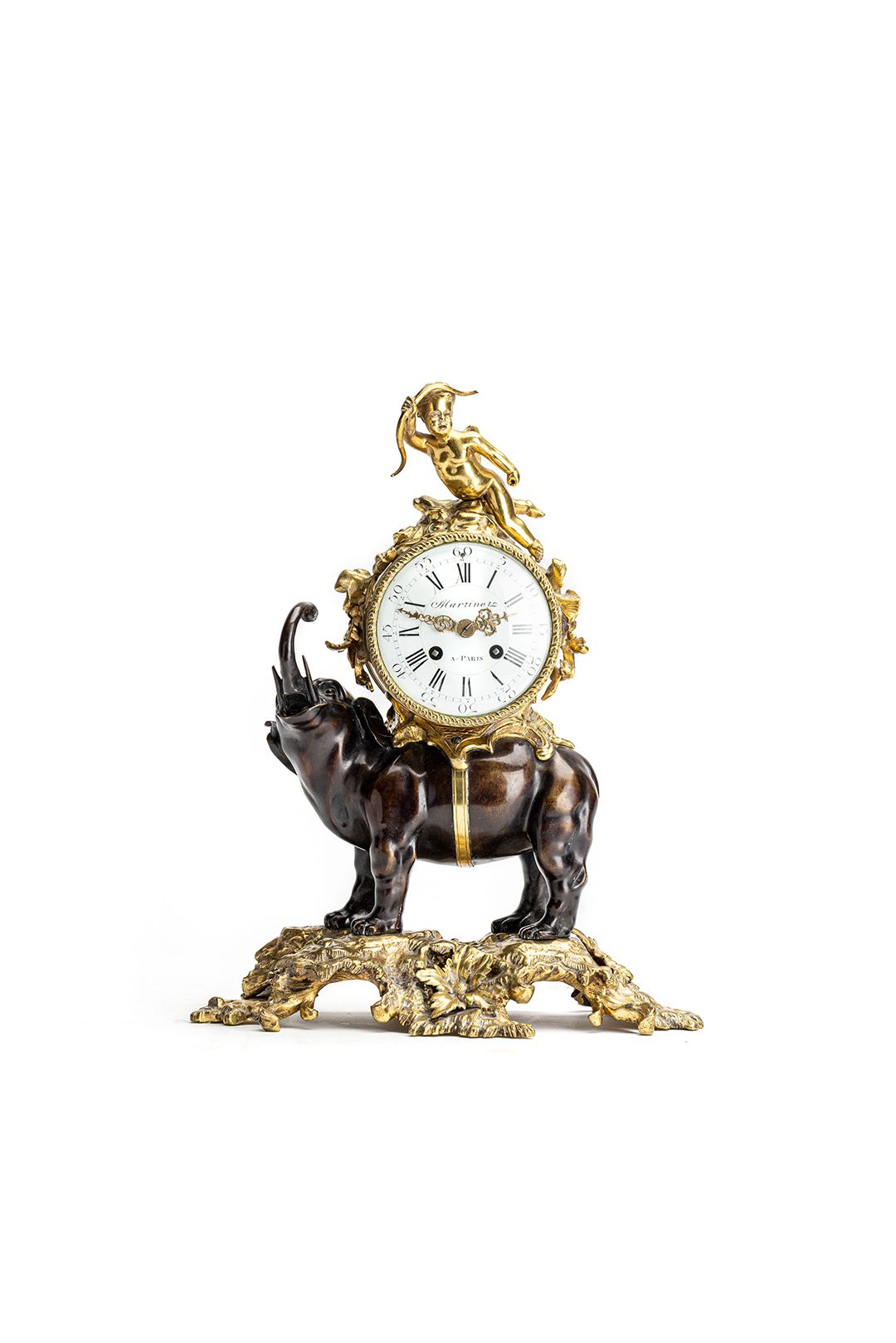 This is a very nice and highly decorative 19th-century mantel clock featuring an elephant carrying the clock on its back - image 1