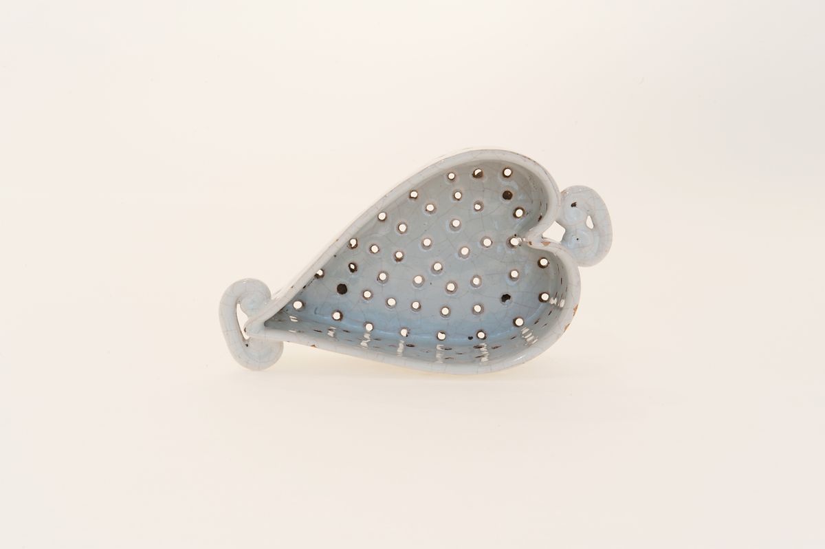 A Heart Shaped Strainer in White Delftware