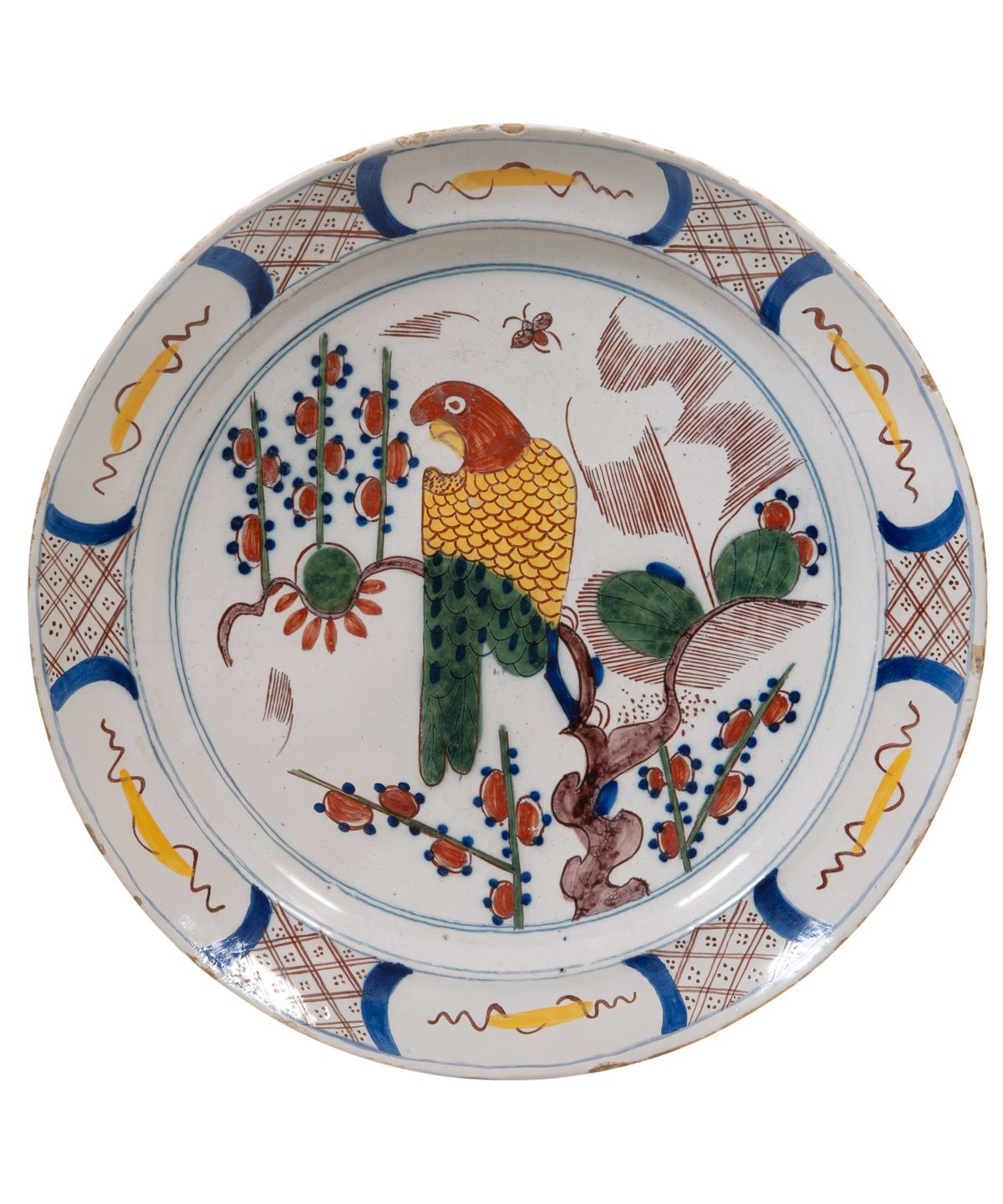 A Polychrome Dutch Delft Charger Depicting a Parrot