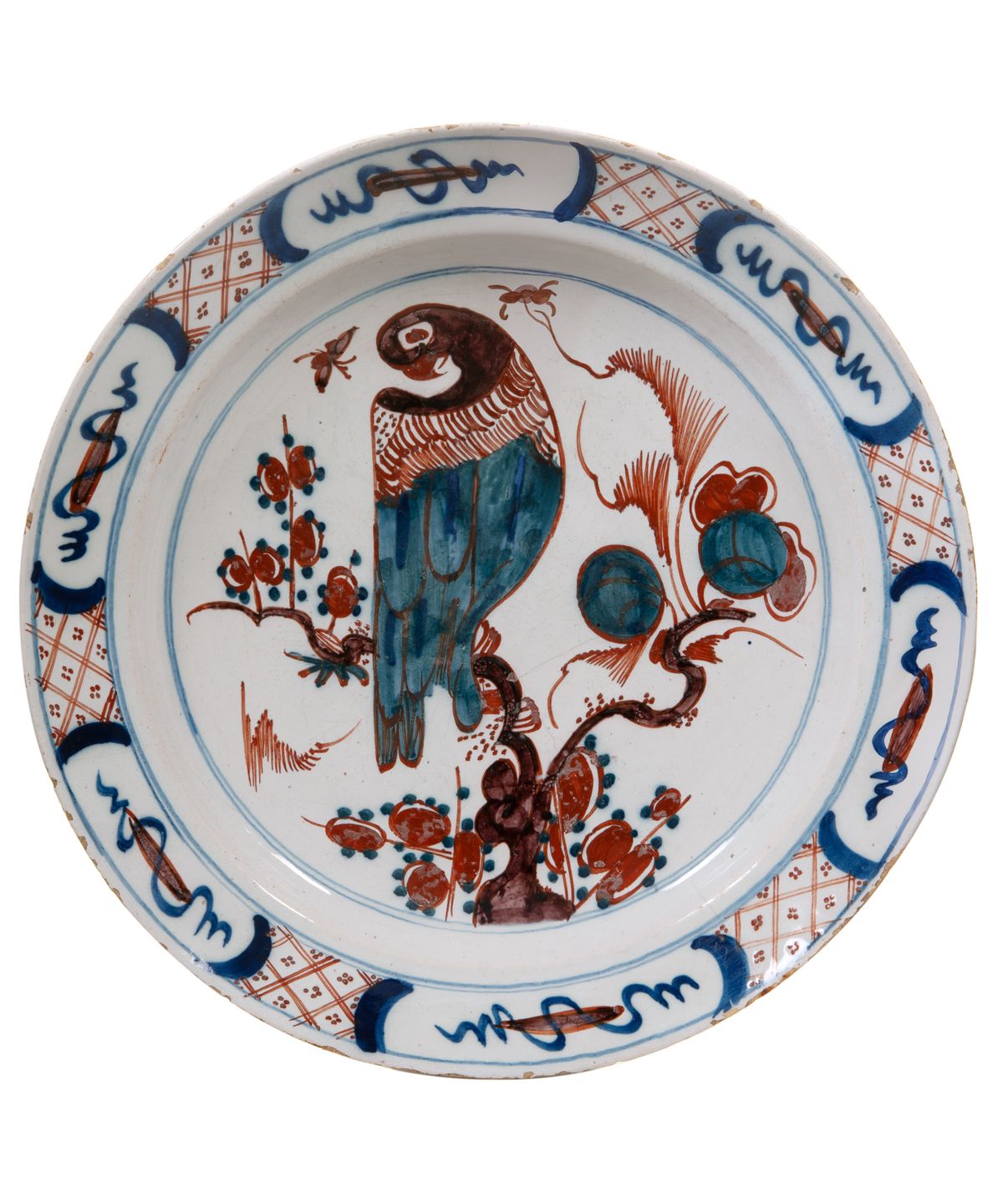 A Polychrome Dutch Delft Charger Depicting a Parrot
