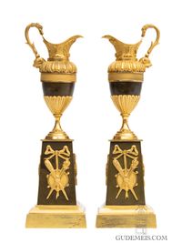 A pair of French Restoration gilt and bronze ewers/candle sticks, circa 1825 - image 1