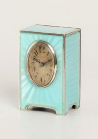 A miniature Swiss silver light blue guilloche translucent enamel timepiece, circa 1900 - image 1