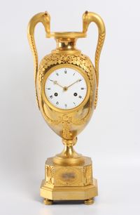 A large French Empire ormolu urn mantel clock with mythical animals, circa 1800 - image 1
