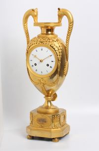 A large French Empire ormolu urn mantel clock with mythical animals, circa 1800 - image 2