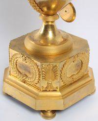 A large French Empire ormolu urn mantel clock with mythical animals, circa 1800 - image 9
