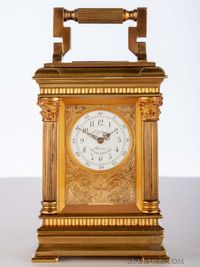 A small French glit brass travel clock by Lepine, circa 1900. - image 2