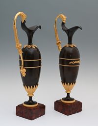 A pair of French Empire patinated bronze and ormolu ewers - image 2