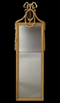A Louis XVI mirror with a medallion - image 2