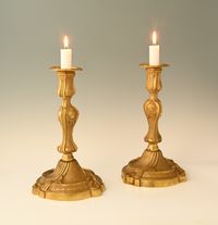 A pair of large fire-gilded bronze candlesticks in the Louis XV style. - image 1