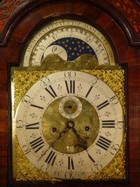 A good and attractive English walnut longcase clock with moonphase, by William Upjohn, circa 1730 - image 3