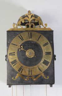 An early French provincial iron and brass Morbier wall clock, circa 1735 - image 1