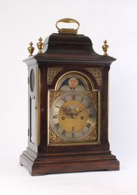 A small English ebonised table clock with moonphase, by Robert Wood, circa 1770 - image 1