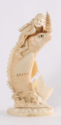 'Man on a Carp', a Japanese carved ivory sculpture, circa 1880 - image 1