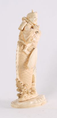 'Man on a Carp', a Japanese carved ivory sculpture, circa 1880 - image 2