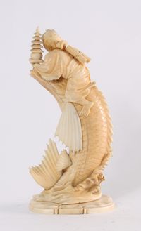 'Man on a Carp', a Japanese carved ivory sculpture, circa 1880 - image 4