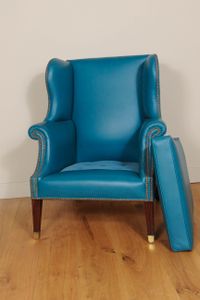 Lovely brightblue leather upholstered English wingchair. - image 4