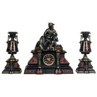 A fantastic black marble ‘retour de l’Egypt’ mantle clock with two side pieces. - image 1