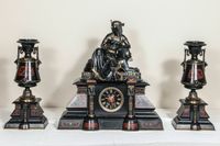 A fantastic black marble ‘retour de l’Egypt’ mantle clock with two side pieces. - image 10