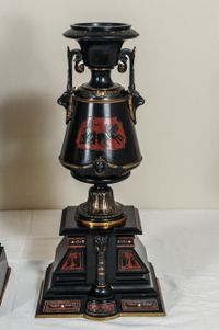 A fantastic black marble ‘retour de l’Egypt’ mantle clock with two side pieces. - image 9