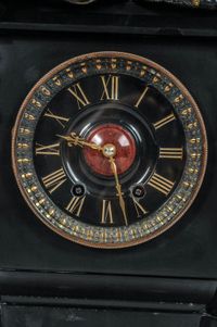A fantastic black marble ‘retour de l’Egypt’ mantle clock with two side pieces. - image 4