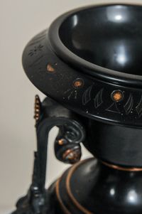 A fantastic black marble ‘retour de l’Egypt’ mantle clock with two side pieces. - image 11