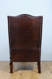 A very unusual and chic crocodile upholstered wing chair. - image 6