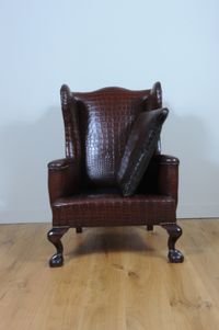 A very unusual and chic crocodile upholstered wing chair. - image 7