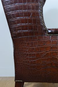 A very unusual and chic crocodile upholstered wing chair. - image 9