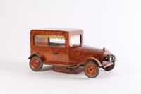An Art Deco thuja burr model of a car with music box, circa 1930 - image 1
