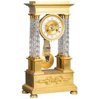 An attractive Charles X ormolu and crystal portico striking 8-day mantel clock - image 1