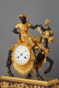 An unusual French ‘Directoire' gilt and patinated bronze mantel clock with young Arab on mule, circa 1800 - image 5