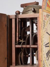 A German Wall Clock with ‘cow’s-tail pendulum’ and wooden wheels circa 1800 - image 4