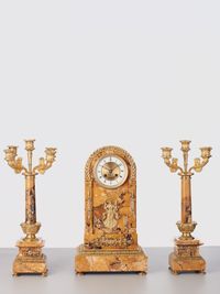A French sienna marble clock with candle holders, circa 1890 - image 1