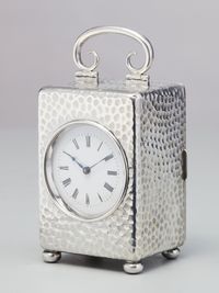 A small English silver travelling clock by William Comyns, circa 1900 - image 2