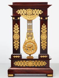 A rare French mahogany and bronze oscillating mantel clock, circa 1830 - image 1