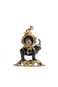 This is a very nice and highly decorative 19th-century mantel clock featuring an elephant carrying the clock on its back - image 3