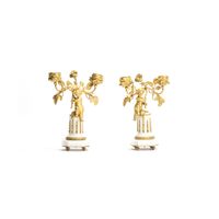 A cute pair of romantic small candlesticks featuring two small kids sitting on a white marble base - image 1