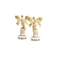 A cute pair of romantic small candlesticks featuring two small kids sitting on a white marble base - image 2