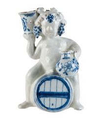 A Blue and White Dutch Delft Bacchus on Wine Barrel - image 1
