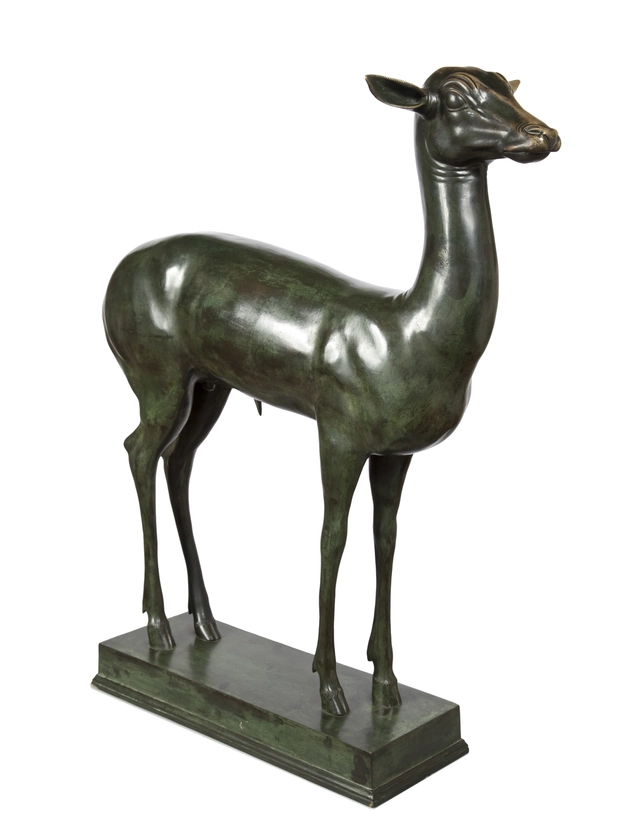 An elegant bronze sculpture of a fawn - image 1