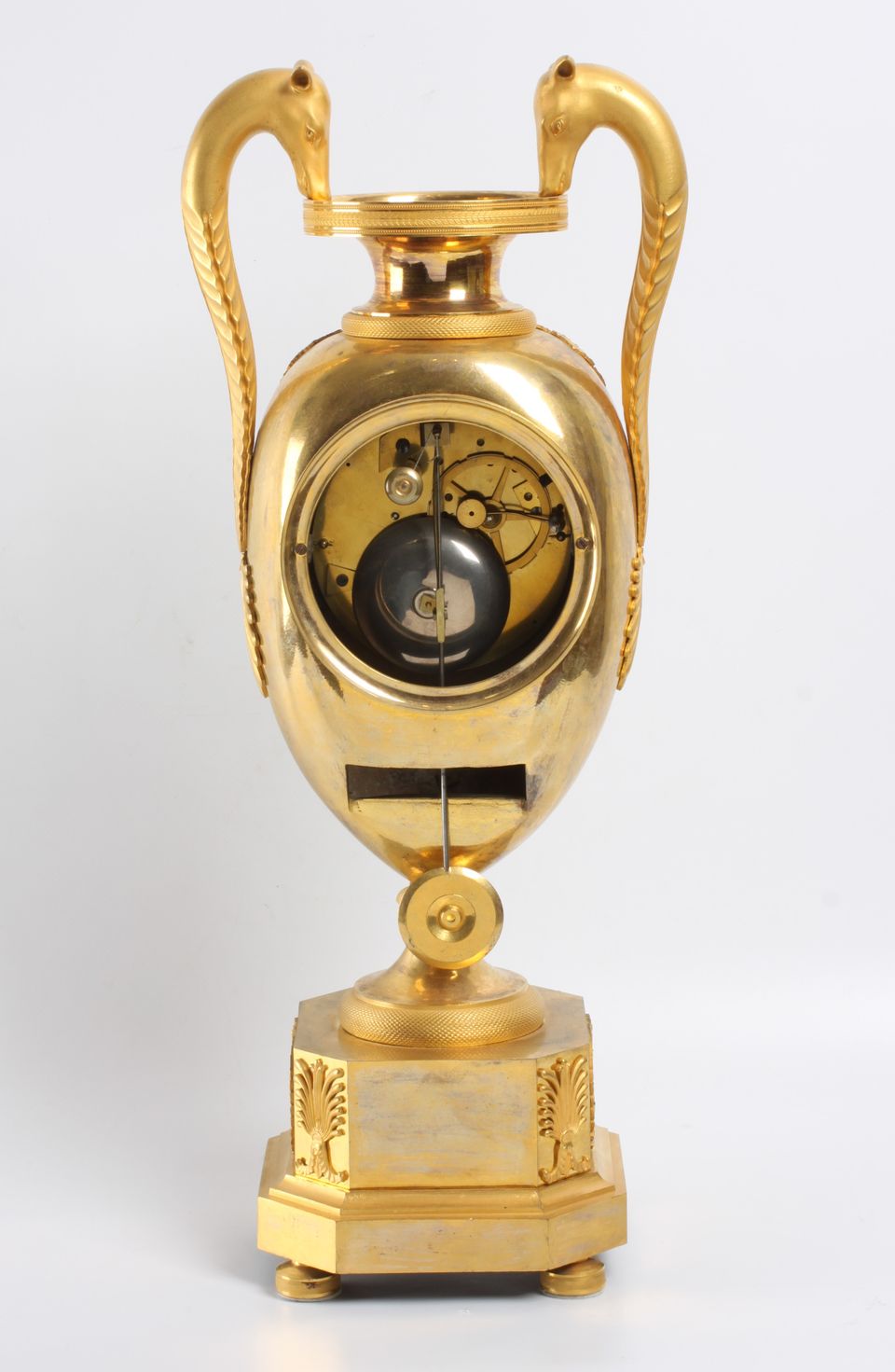A large French Empire ormolu urn mantel clock with mythical animals, circa 1800 - image 4