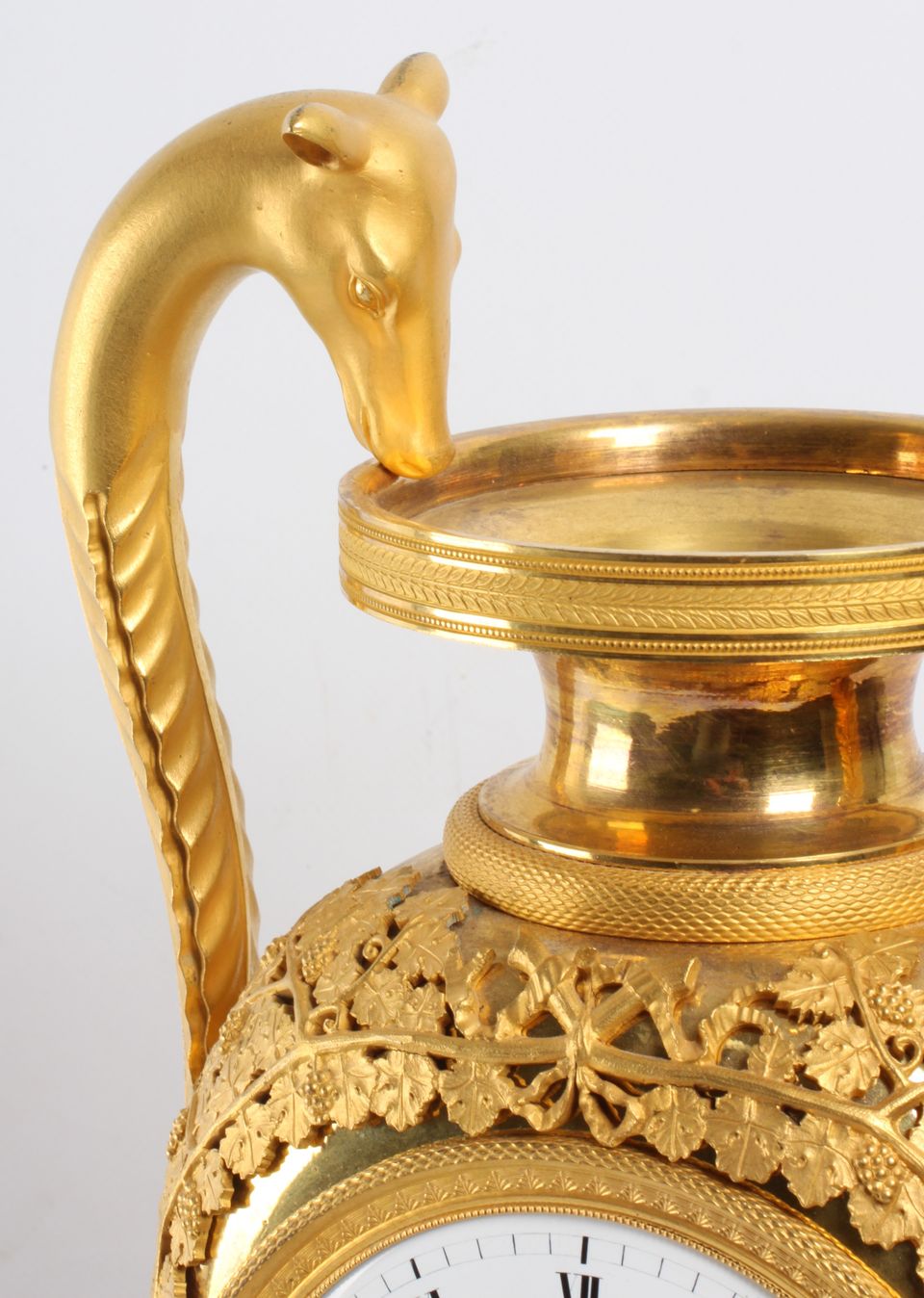A large French Empire ormolu urn mantel clock with mythical animals, circa 1800 - image 7