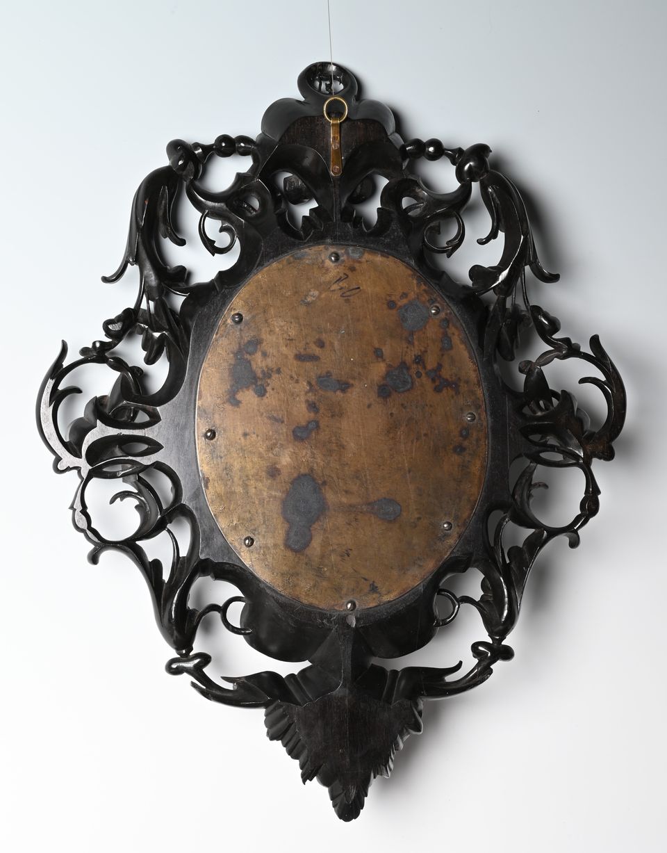 A decorative mirror. - image 4