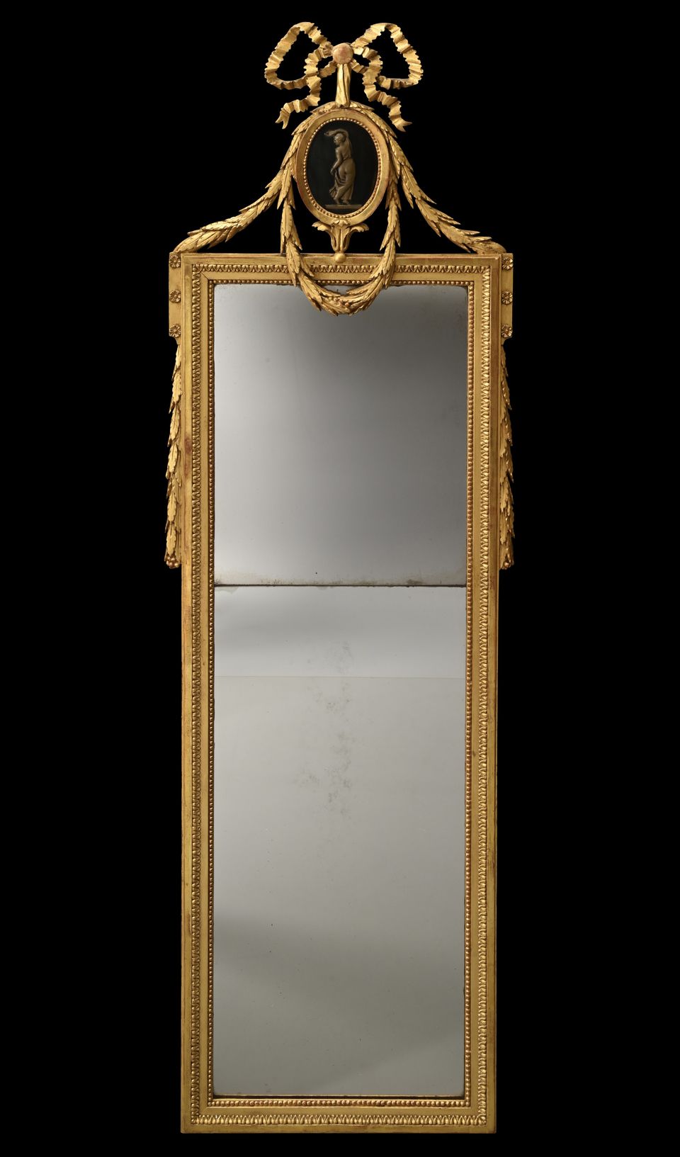A Louis XVI mirror with a medallion - image 2