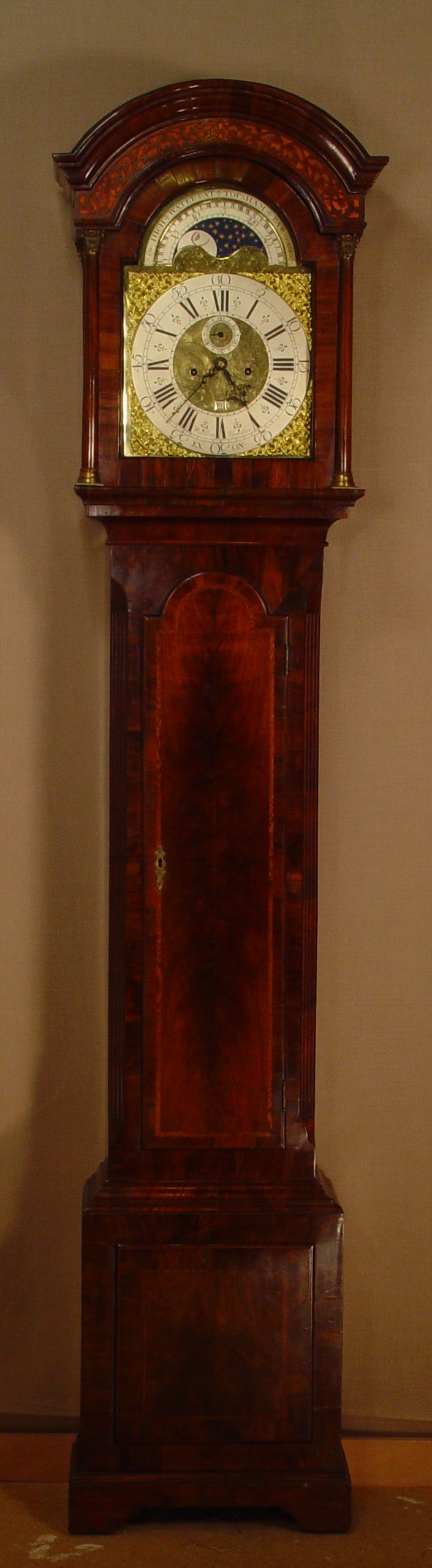 A good and attractive English walnut longcase clock with moonphase, by William Upjohn, circa 1730 - image 2