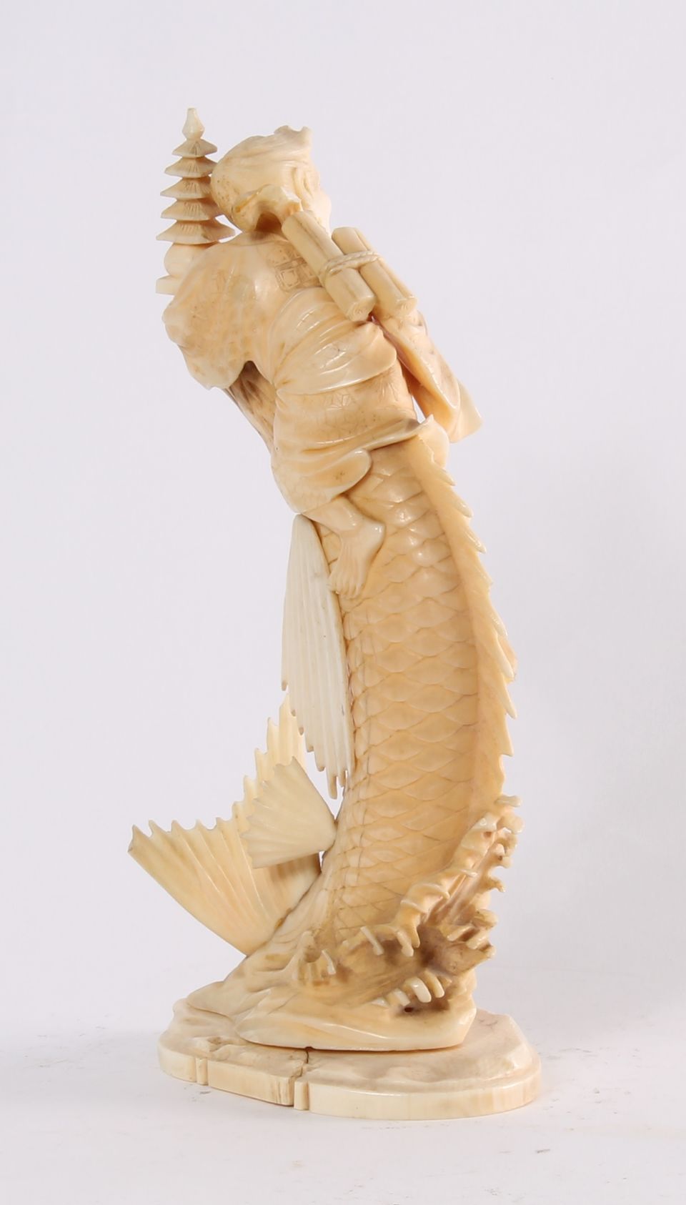 'Man on a Carp', a Japanese carved ivory sculpture, circa 1880 - image 3