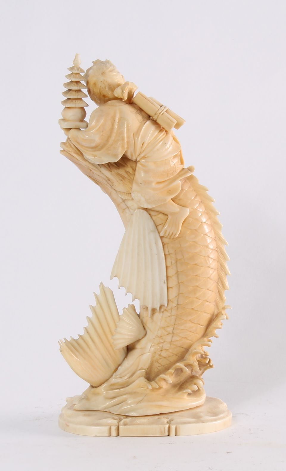 'Man on a Carp', a Japanese carved ivory sculpture, circa 1880 - image 4