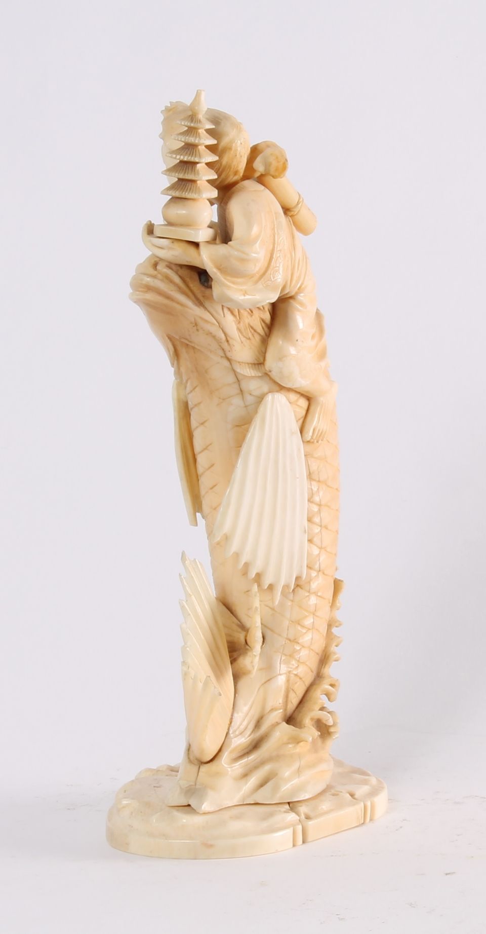 'Man on a Carp', a Japanese carved ivory sculpture, circa 1880 - image 5